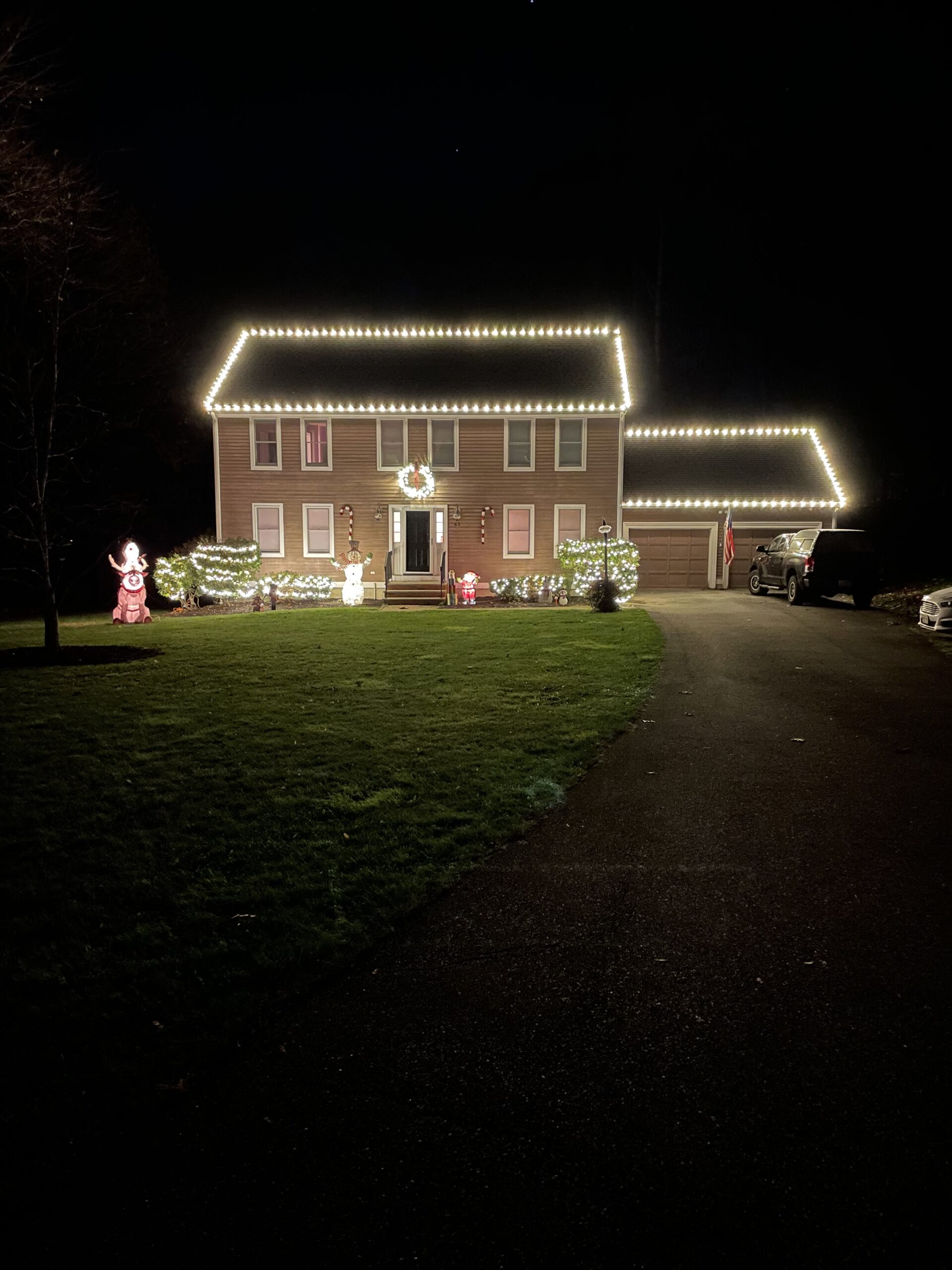 Holiday lighting on home in Tewksbury, MA